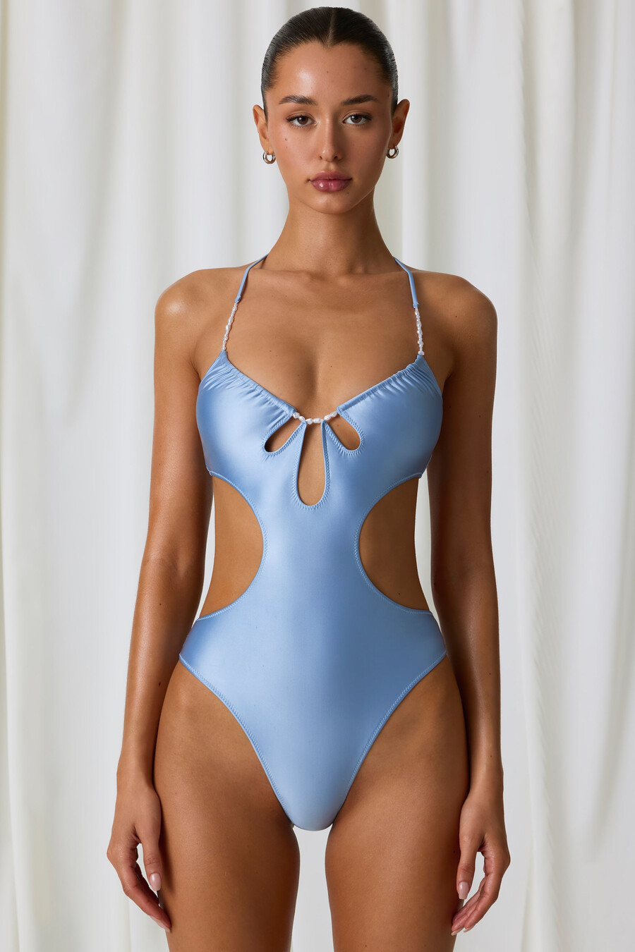 Ολόσωμο μαγιό με ντεκολτέ και κοψίματα σε γαλάζιο χρώμα